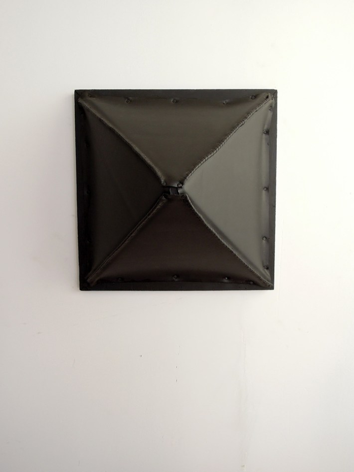 “Rivet” 2012. Vinyl, wood, latex paint, thread, cut tacks. 16 x 16 x 10 inches